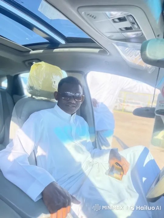 Relaxed Driver Enjoying a Cigarette in Sunlit Car – AI Generated Video | Hailuo AI