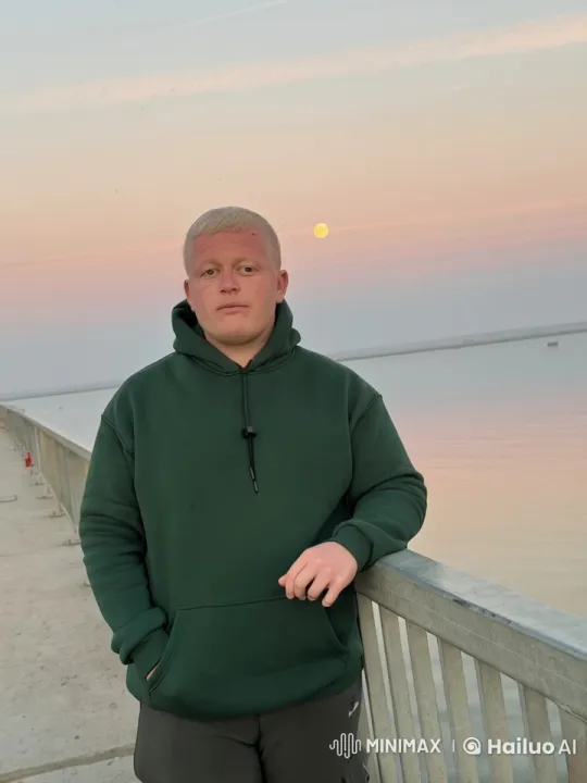 Man Smokes Cigar on Pier at Sunset – AI Generated Video | Hailuo AI