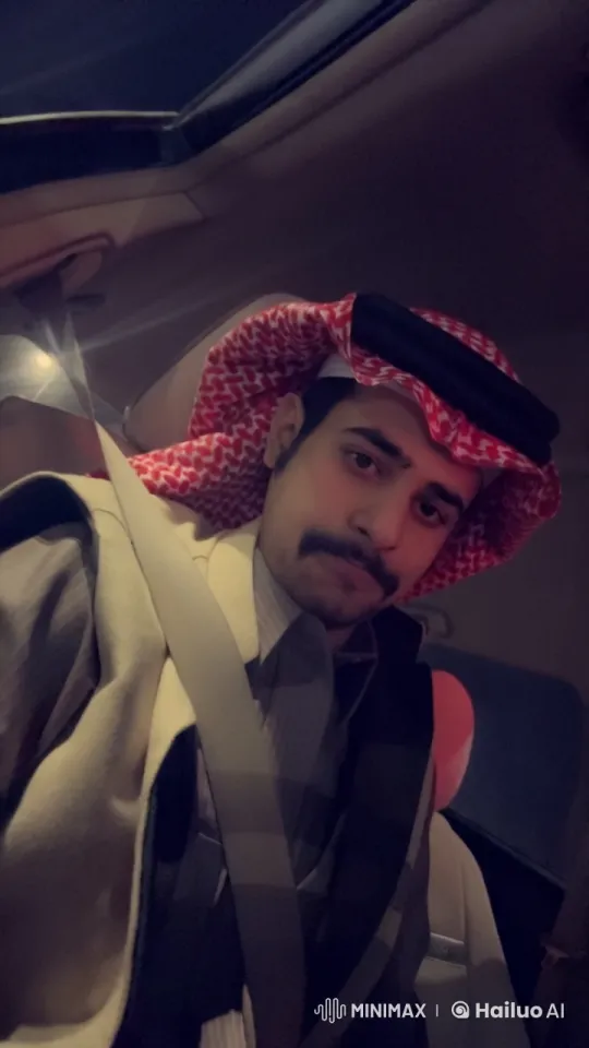 Man in Traditional Attire Smokes in Dimly Lit Car – AI Generated Video | Hailuo AI