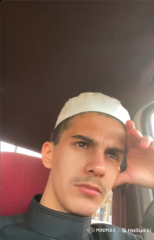 Young Man Smoking in a Car with a Calm Atmosphere – AI Generated Video | Hailuo AI