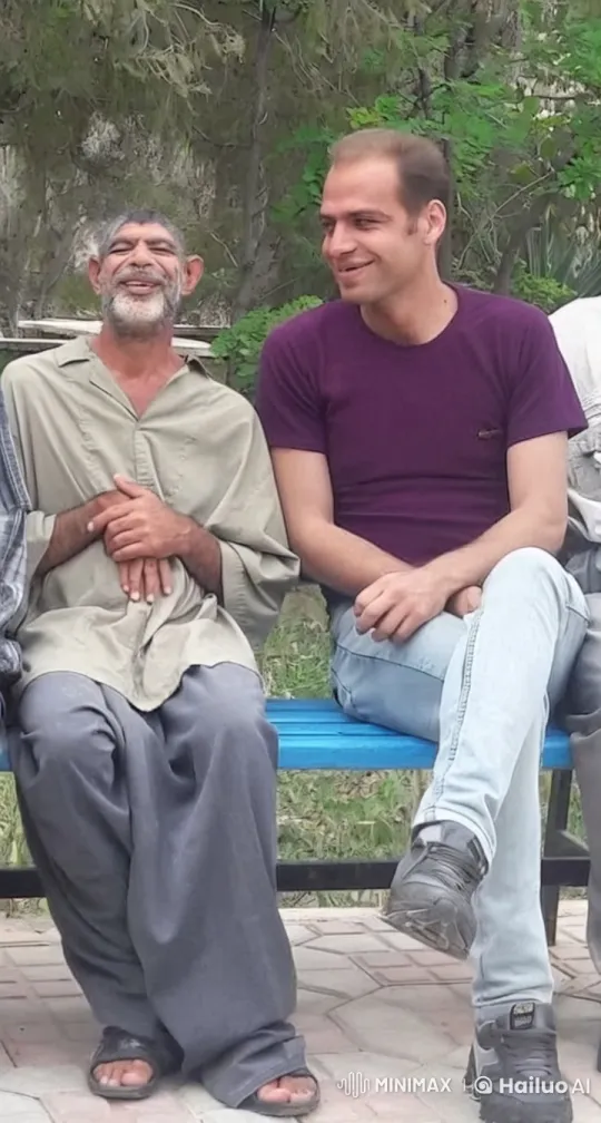 Affectionate Moment Between Two Men in Park – AI Generated Video | Hailuo AI