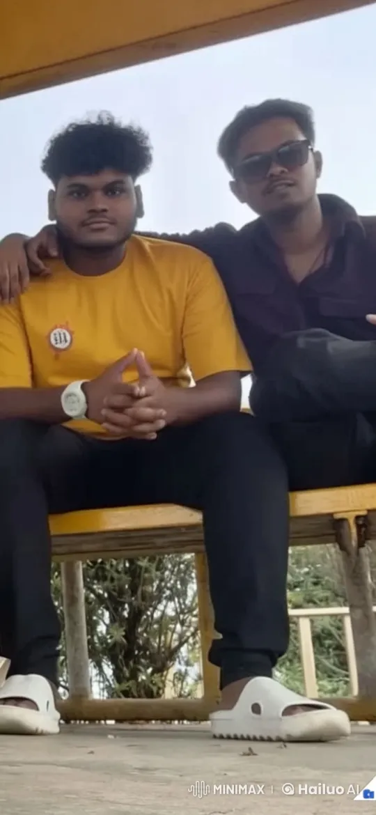 Two Friends Share a Kiss on a Park Bench – AI Generated Video | Hailuo AI
