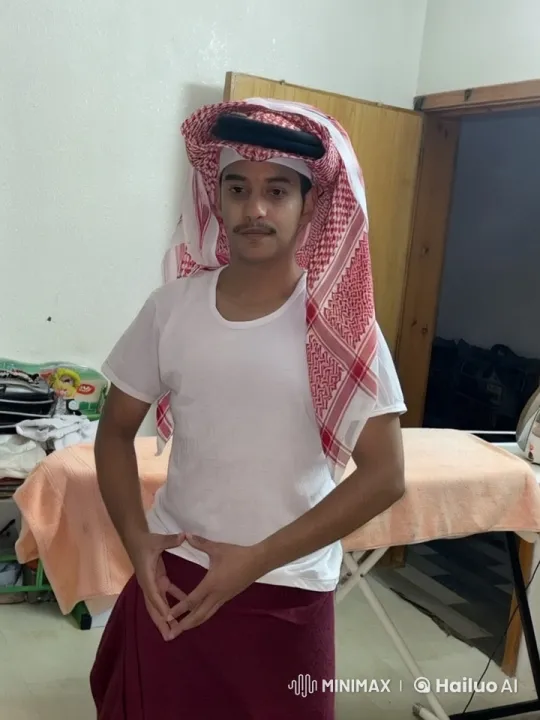 Traditional Attire, Smoking in a Quiet Room – AI Generated Video | Hailuo AI