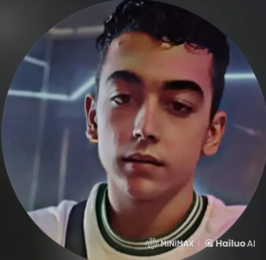 Young Man Contemplates in Neon-Lit Room – AI Generated Video | Hailuo AI