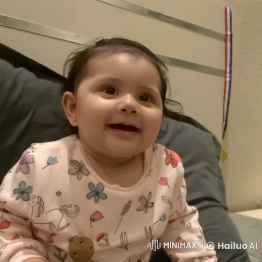 Innocent Child on Colorful Bed Display – AI Generated Video | Hailuo AI