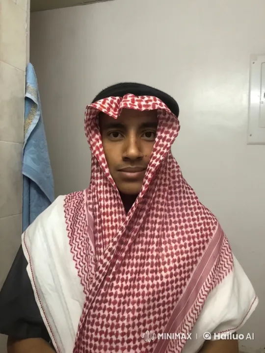Person Smoking in Bathroom with Keffiyeh – AI Generated Video | Hailuo AI