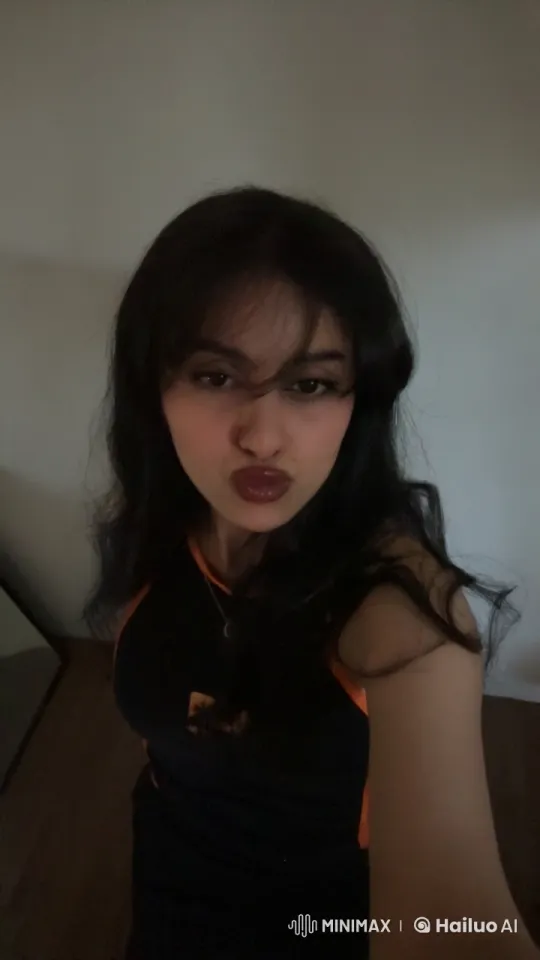 Woman Smoking Calmly in Dimly Lit Room – AI Generated Video | Hailuo AI