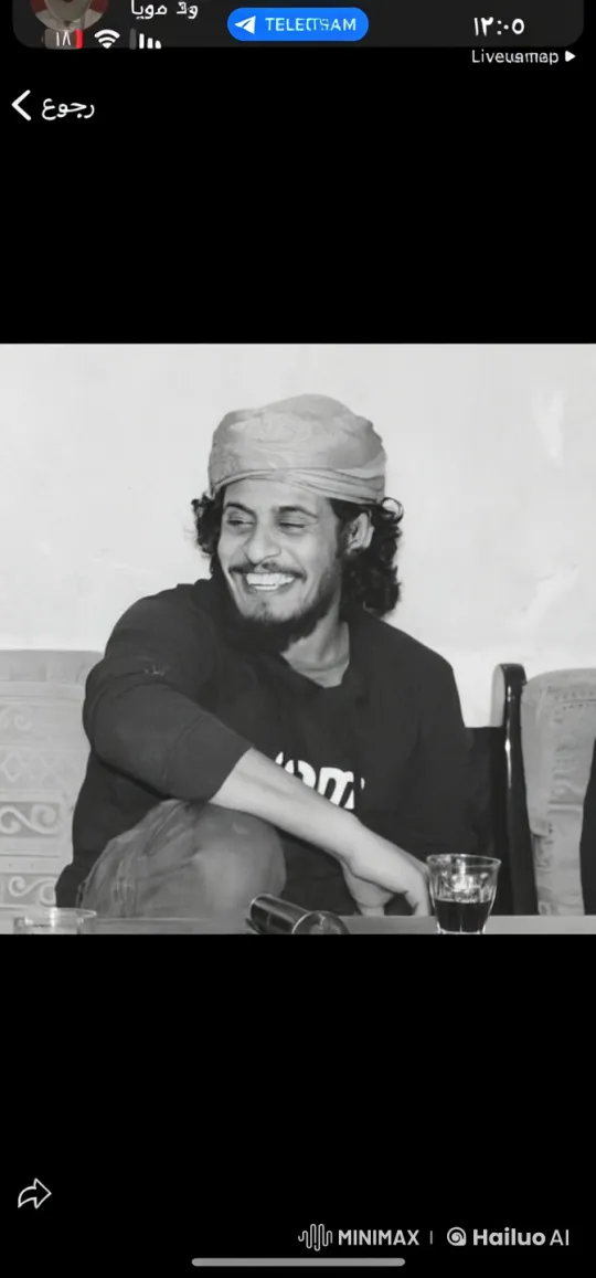 Person Smoking and Sipping Beverage in Monochrome Setting – AI Generated Video | Hailuo AI