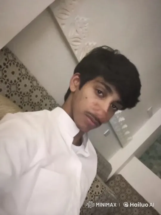 Young Man Smoking Calmly on Patterned Couch – AI Generated Video | Hailuo AI