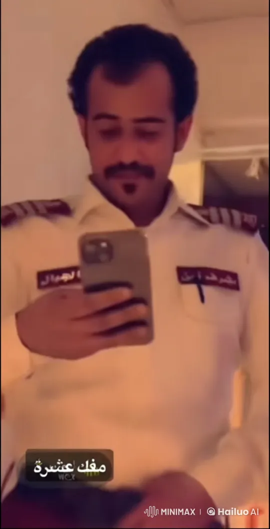 Man in White Uniform Smokes, Checks Phone – AI Generated Video | Hailuo AI