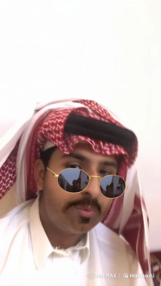 Man Smoking Leisurely in Traditional Attire – AI Generated Video | Hailuo AI