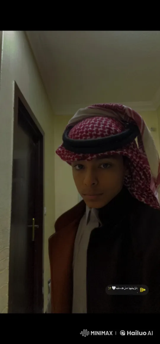 Traditional Attire and Smoking in a Dimly Lit Room – AI Generated Video | Hailuo AI