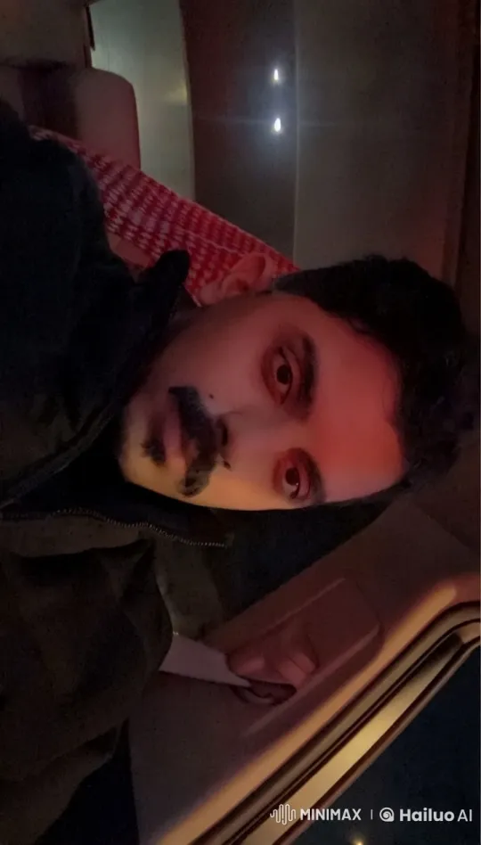 Man Smoking in Dimly Lit Car Interior – AI Generated Video | Hailuo AI