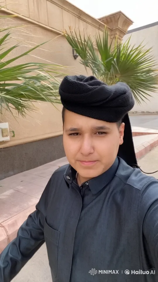 Man Smokes by Palm Tree in Traditional Attire – AI Generated Video | Hailuo AI