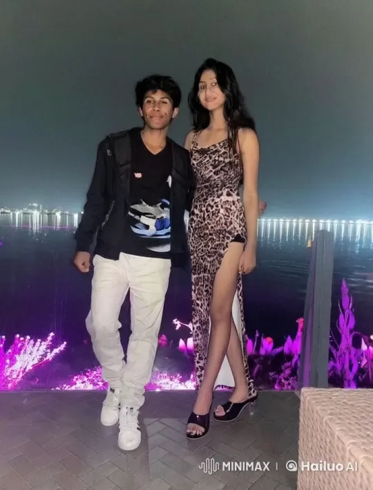 Romantic Couple Kissing by Lighted Waterfront – AI Generated Video | Hailuo AI