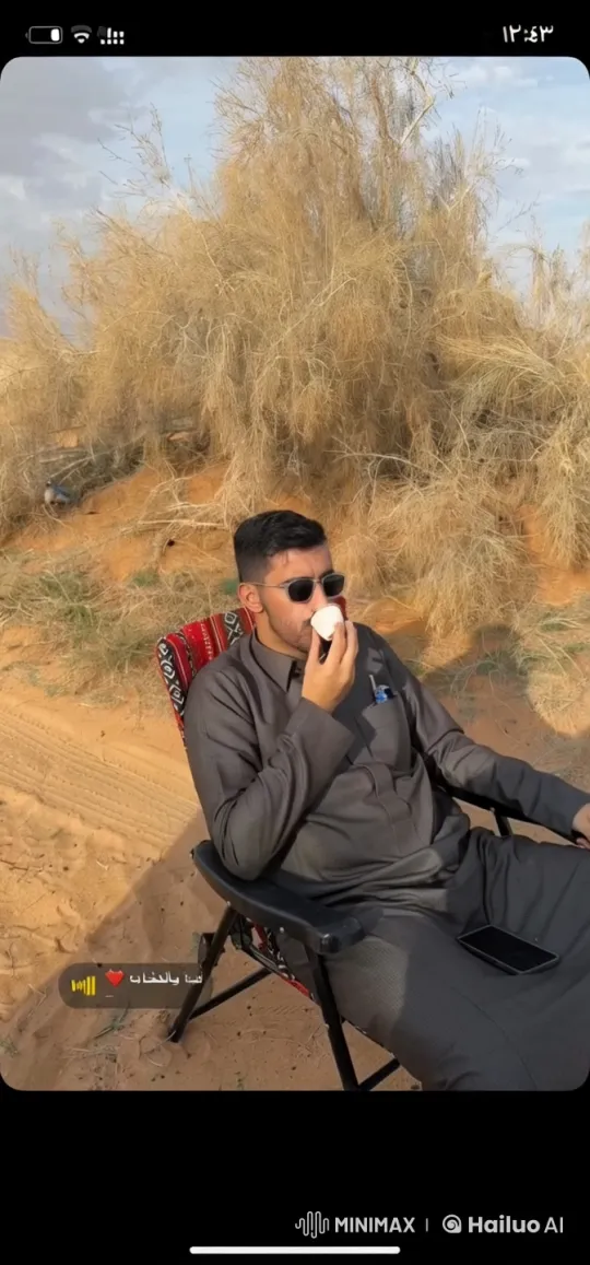 Man Smokes Cigarette in Serene Desert Setting – AI Generated Video | Hailuo AI