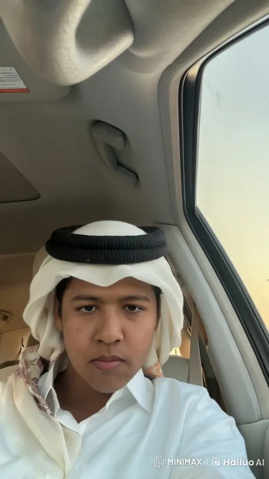 Traditional Attired Person Smoking in Parked Car – AI Generated Video | Hailuo AI