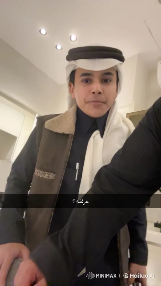 Man Smoking in Traditional Attire Indoors – AI Generated Video | Hailuo AI