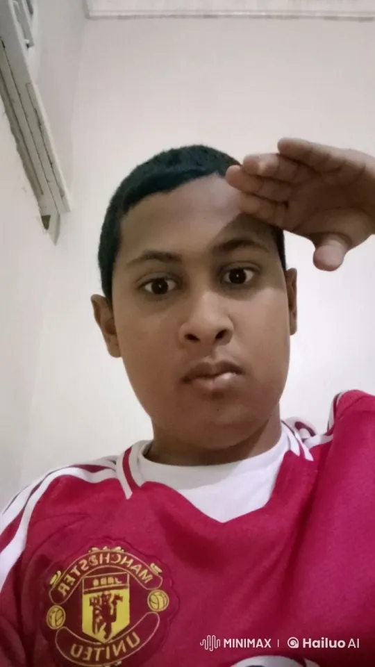 Manchester United Fan Smoking Calmly Indoors – AI Generated Video | Hailuo AI
