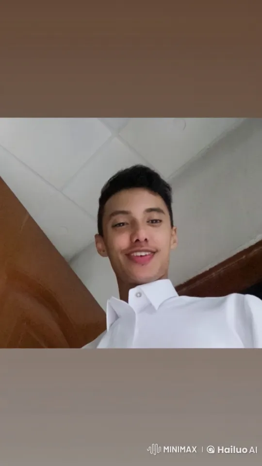 Young Man Smoking Calmly in Bright Room – AI Generated Video | Hailuo AI