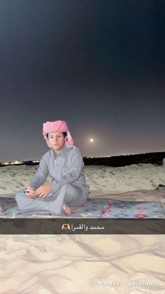 Desert Serenity: Person Reflecting Under Moonlight – AI Generated Video | Hailuo AI
