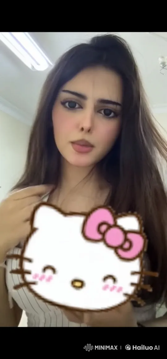 Woman Smoking with Hello Kitty Image in Well-Lit Room – AI Generated Video | Hailuo AI