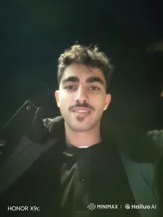 Nighttime Reflection: A Person Smokes in Silence – AI Generated Video | Hailuo AI