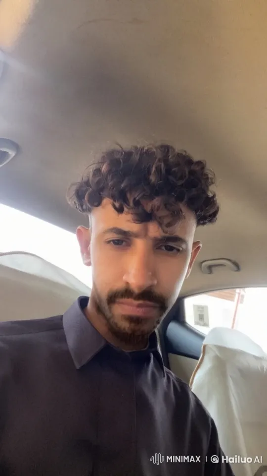 Man Smokes Cigarette in Sunlit Car Loop – AI Generated Video | Hailuo AI