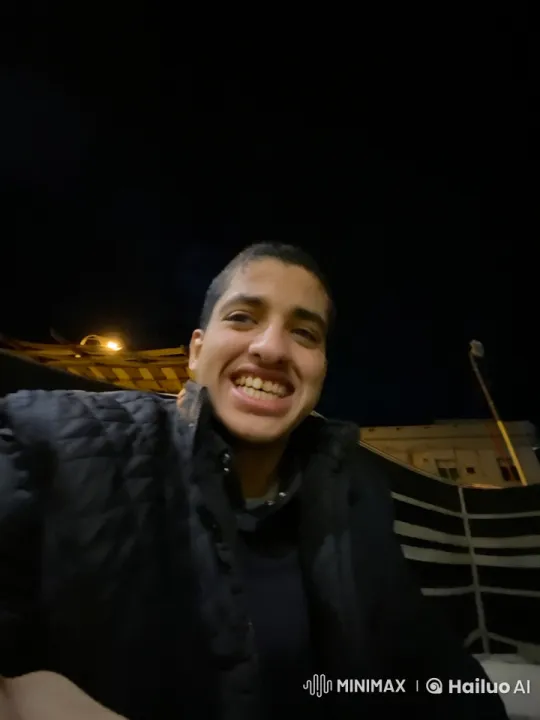 Nighttime Smoker Reflects Under Dim Streetlight – AI Generated Video | Hailuo AI