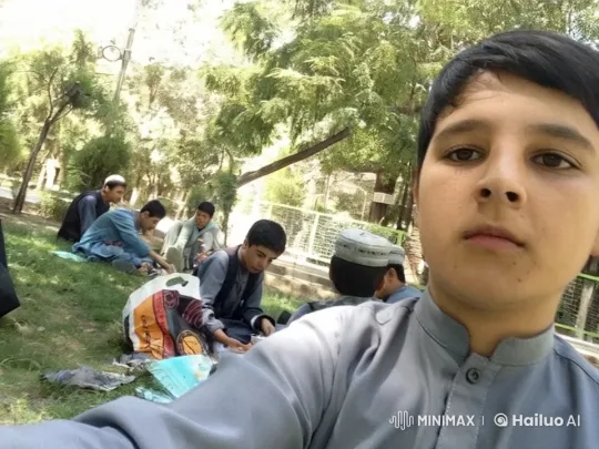Young Men Enjoying a Peaceful Picnic in the Park – AI Generated Video | Hailuo AI