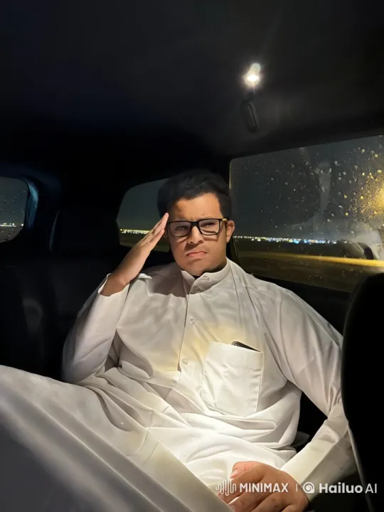 Man Relaxing in Car, Smoking, City Lights Reflection – AI Generated Video | Hailuo AI