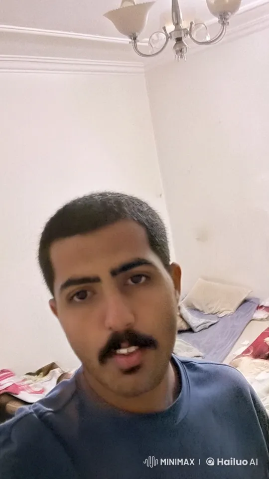 Young Man Smokes Calmly in Minimalist Bedroom – AI Generated Video | Hailuo AI