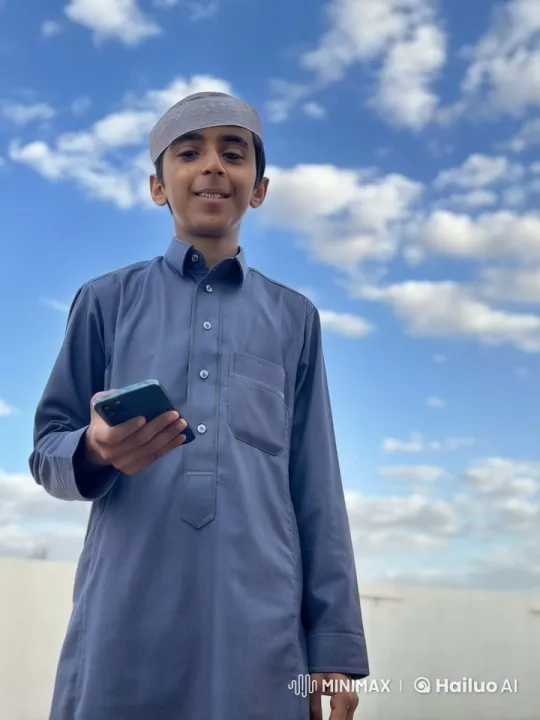 Young Man Smoking Under Clear Sky – AI Generated Video | Hailuo AI