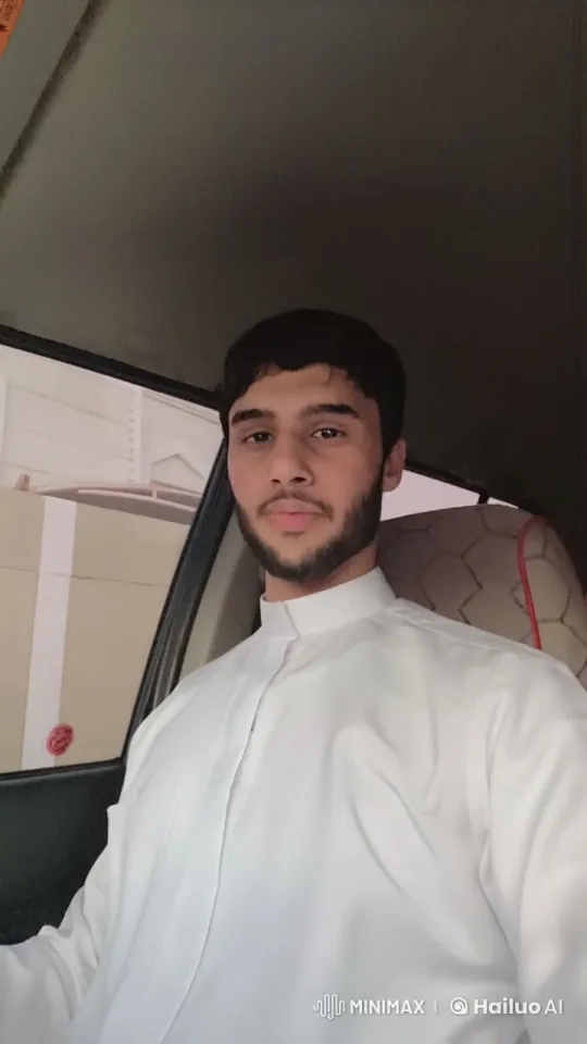 Traditional Attired Person Smoking in Car – AI Generated Video | Hailuo AI
