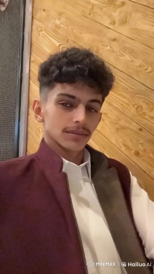 Individual Contemplating with Cigarette Against Wooden Wall – AI Generated Video | Hailuo AI