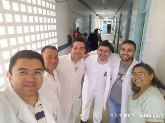 Group Photo in Bright Hallway with Casual Atmosphere – AI Generated Video | Hailuo AI