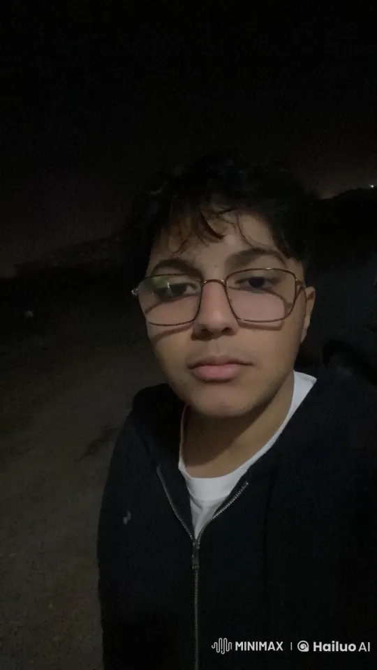 Nighttime Outdoor Smoking Scene with Subtle Light – AI Generated Video | Hailuo AI