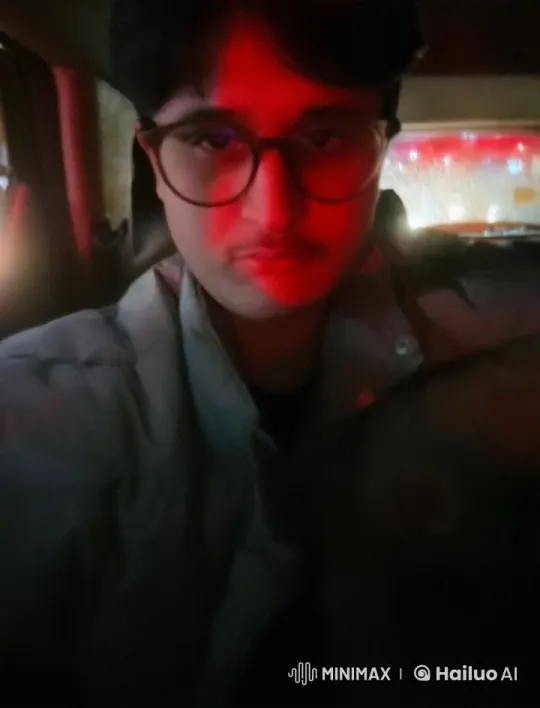 Nighttime Reflection: Person Smoking in Dimly Lit Car – AI Generated Video | Hailuo AI