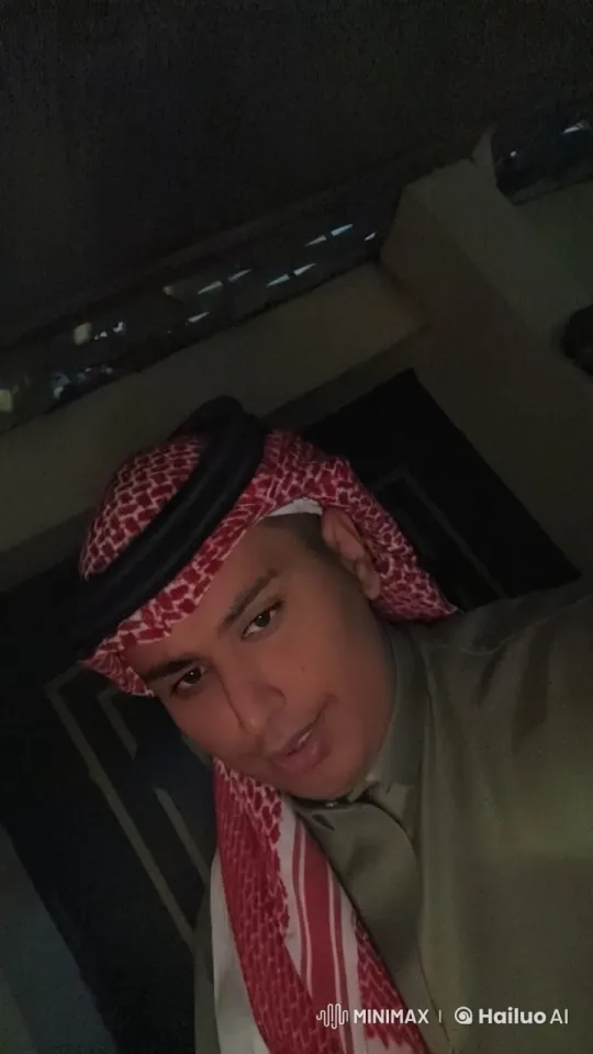 Man Smokes Cigarette in Dimly Lit Room with Keffiyeh – AI Generated Video | Hailuo AI