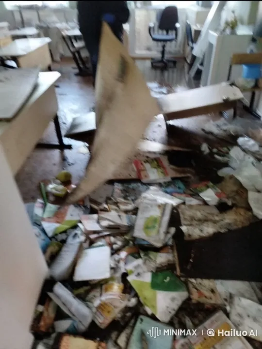 Disorderly Classroom Aftermath with Person Cleaning Up – AI Generated Video | Hailuo AI