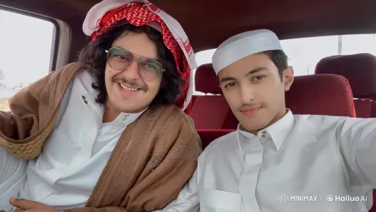Two Men in Traditional Dress Inside Stationary Car – AI Generated Video | Hailuo AI