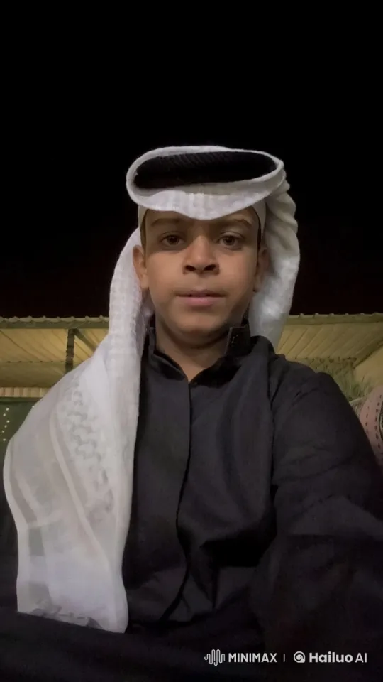 Traditional Attire Smoking Scene in Serene Outdoor Night Setting – AI Generated Video | Hailuo AI