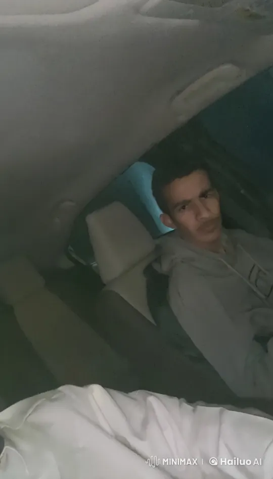 Nighttime Car Interior with Person Smoking – AI Generated Video | Hailuo AI