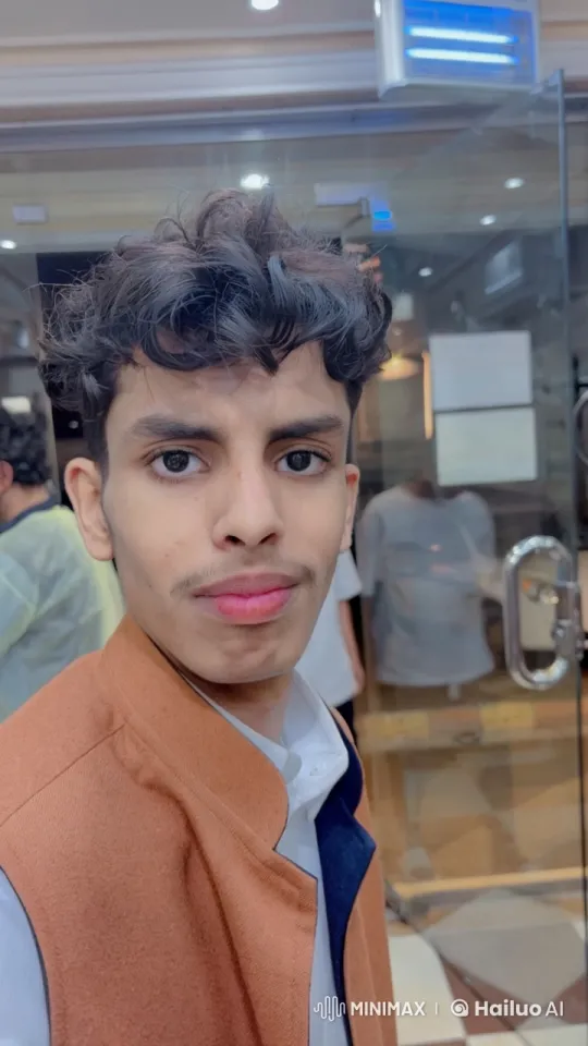 Young Man Smoking Cigarette in Modern Establishment – AI Generated Video | Hailuo AI