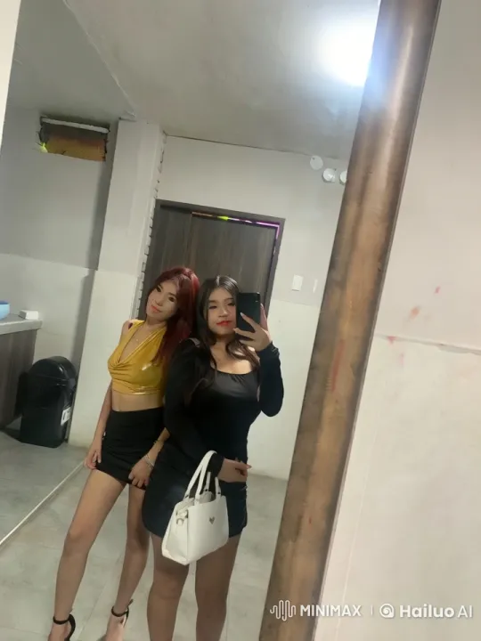 Two Women Taking a Selfie in a Minimalist Bathroom – AI Generated Video | Hailuo AI