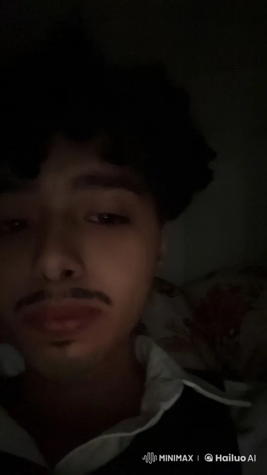 Intimate Smoking Scene in Dimly Lit Room – AI Generated Video | Hailuo AI