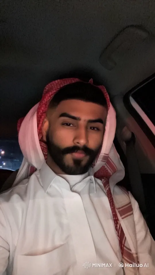 Middle Eastern Man Smoking in Dimly Lit Car – AI Generated Video | Hailuo AI