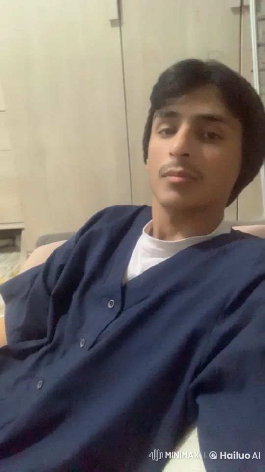 Contemplative Smoking Scene in Cozy Living Room – AI Generated Video | Hailuo AI
