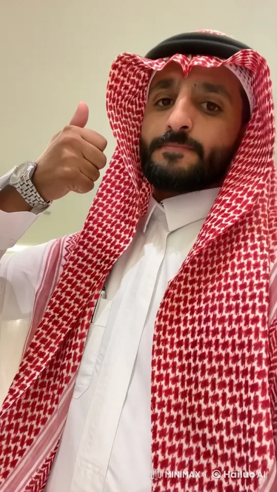 Man in Thobe and Keffiyeh Lights Cigarette with Composure – AI Generated Video | Hailuo AI