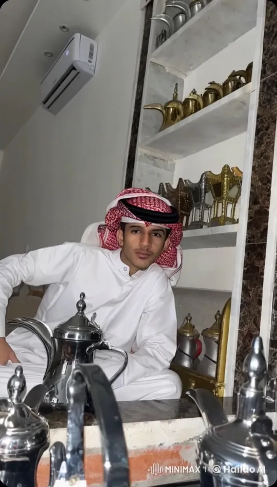 Man Smokes by Shelves of Traditional Teapots – AI Generated Video | Hailuo AI